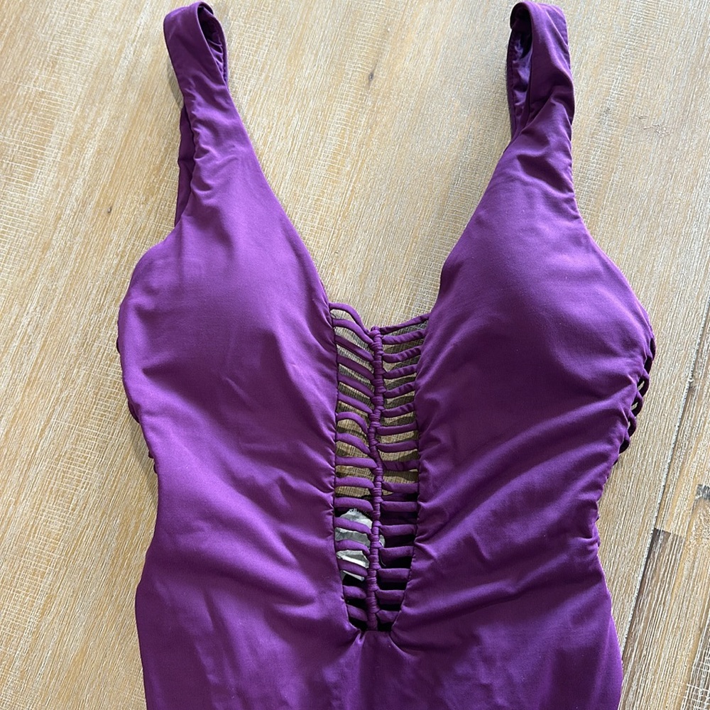 BECCA one piece swimsuit with cutouts